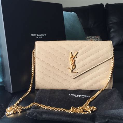 creme ysl bag